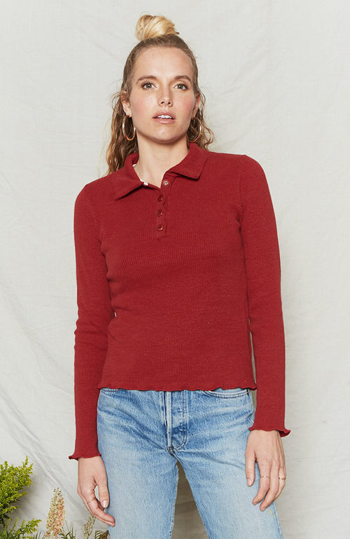 Merlot long sleeve top has fitted body and sleeves with collar and button placket.