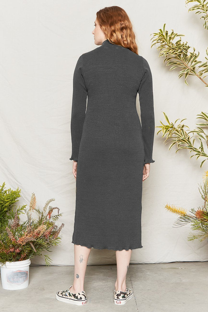 Vintage Black midi dress with fitted body and sleeves, and a mock neck.