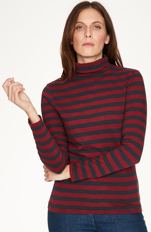 Ruby Red/Midnight Navy striped roll turtleneck with relaxed, feminine fit and long sleeves. 